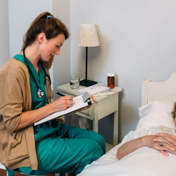 female-doctor-filling-out-a-questionnaire-2025-03-13-05-40-09-utc